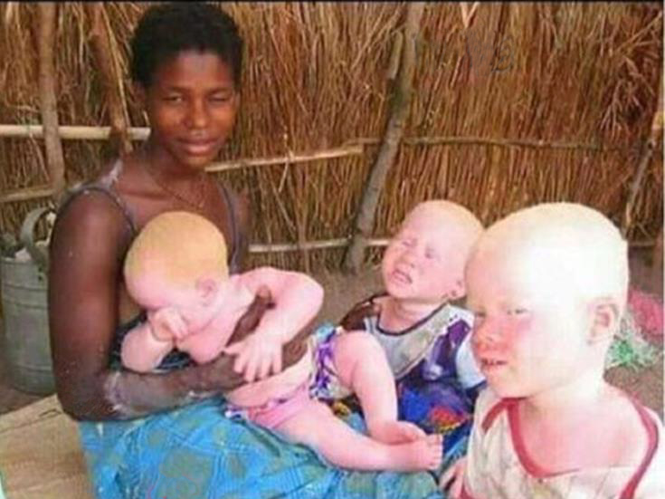 Black Mother with White Babies
