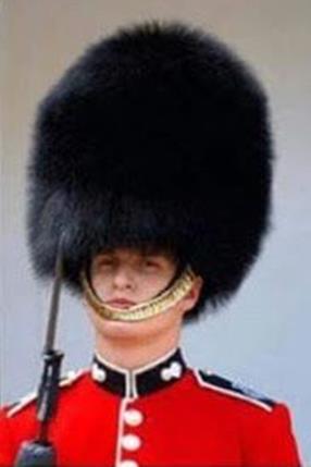 British soldier wearing copied hair style as a hat