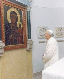 Pope praying to Black Madonna and Child